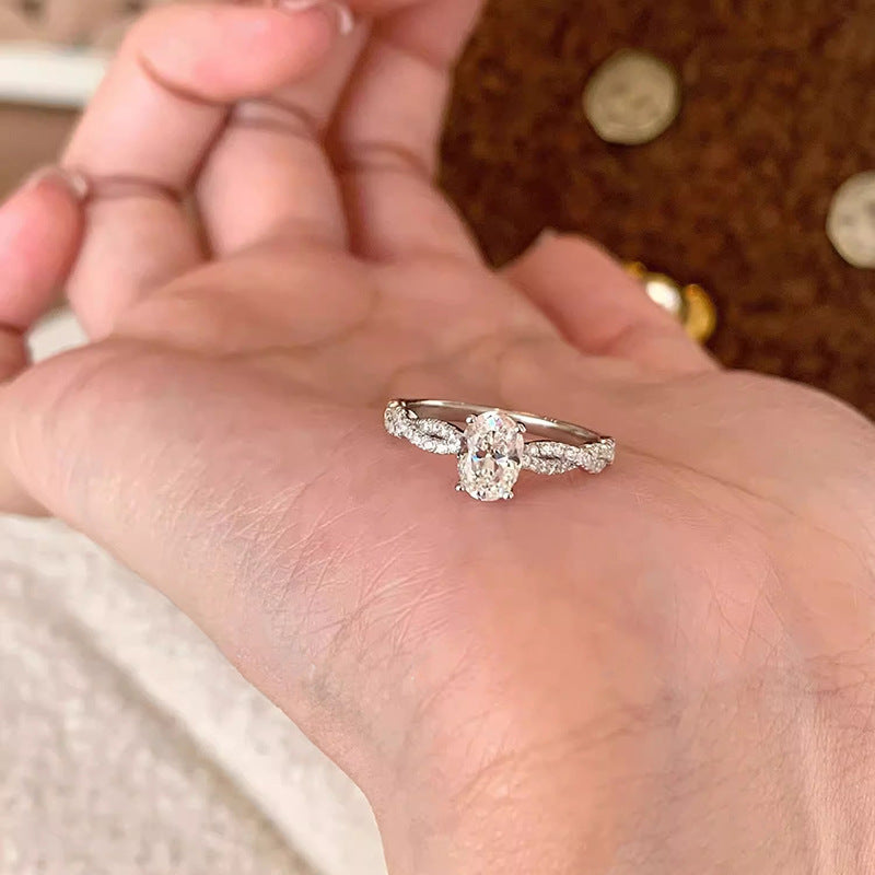 Ladies ring with sparkling zirconia and timeless wave pattern Nin Boutique