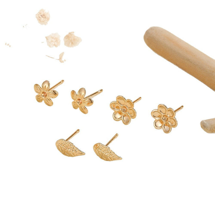 Women's earrings in floral design with intricate flowers and leaves Nin Boutique