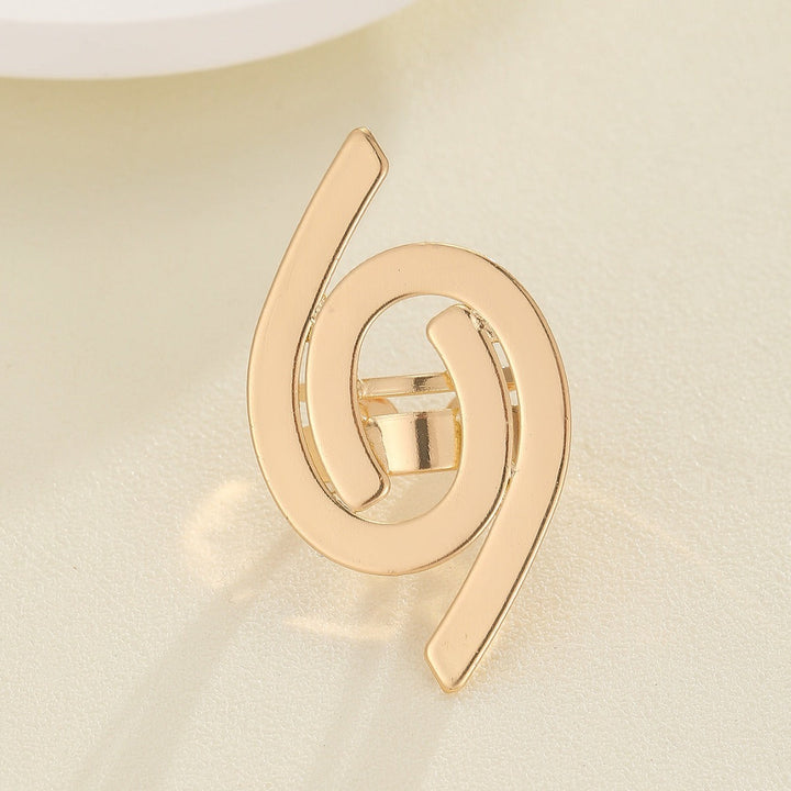 Women's ring with elaborate shell and bow motif Nin Boutique