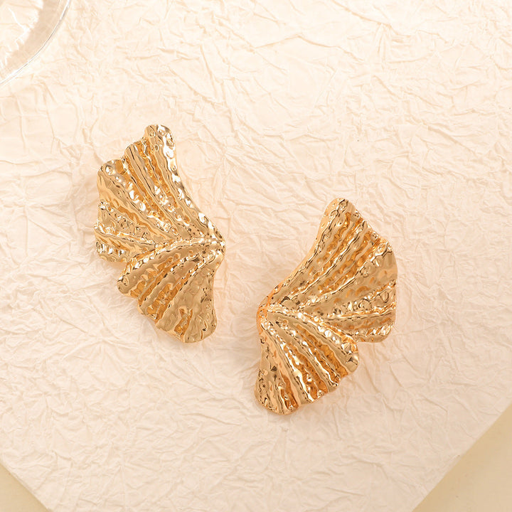 Ladies earrings with stylish shell design and antique finish Nin Boutique
