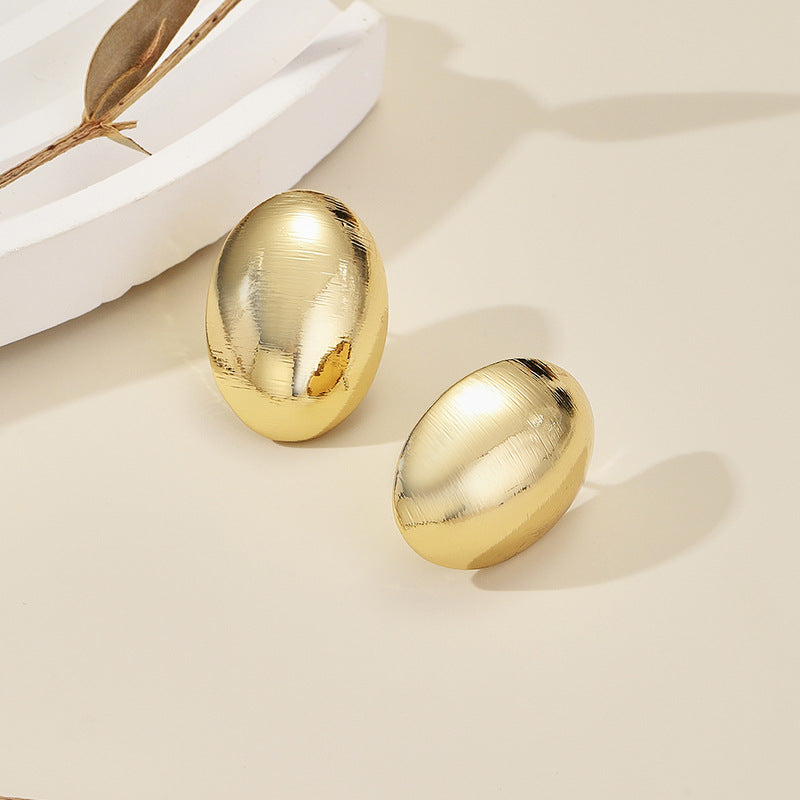 Women's earrings with elaborate scale pattern Nin Boutique