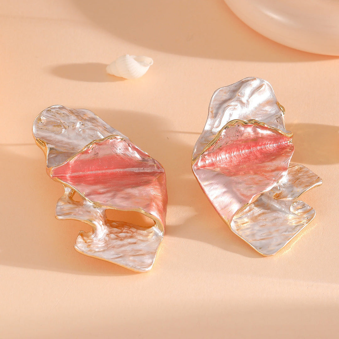 Ladies earrings in elaborate shell design Nin Boutique
