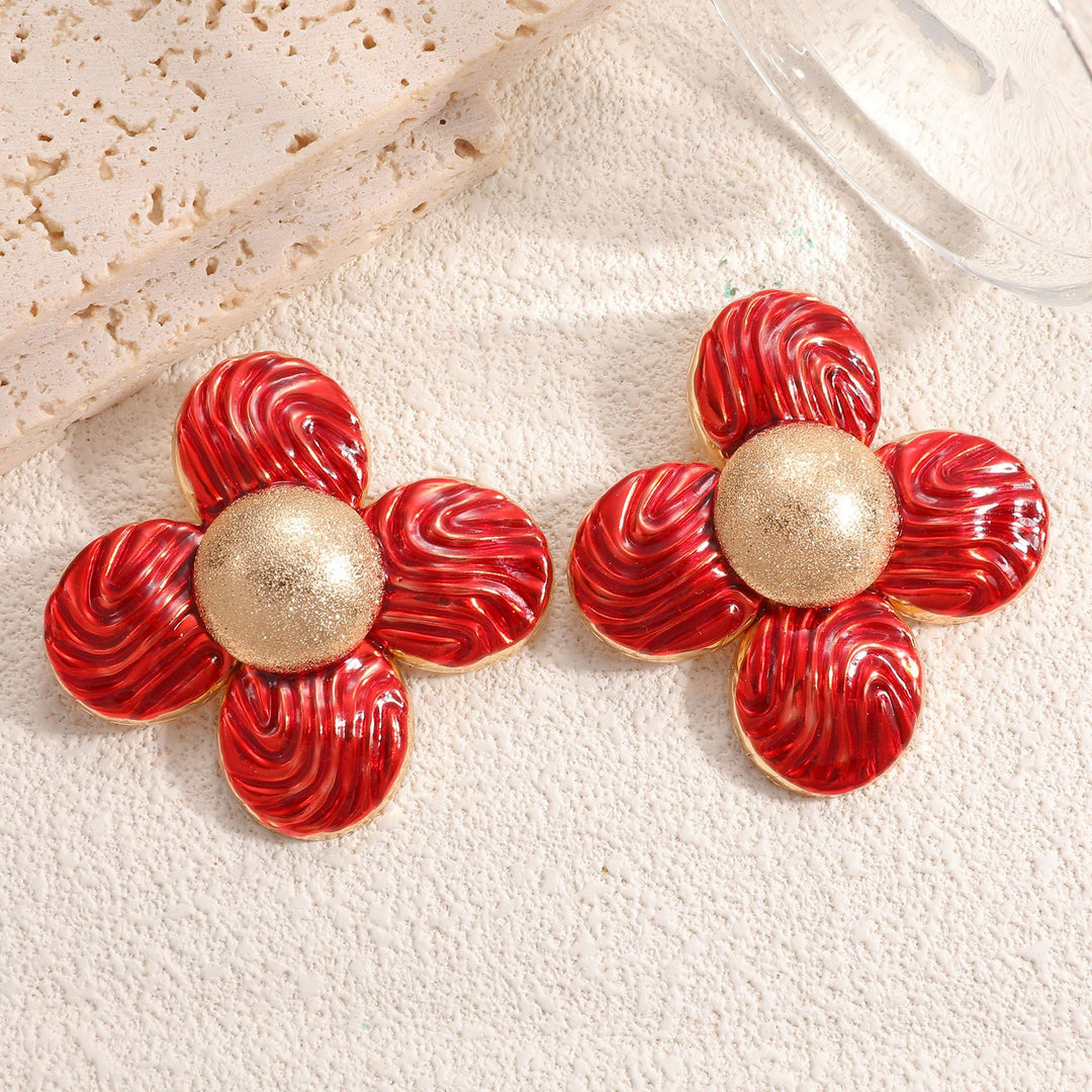 Ladies earrings in elaborate flower pattern Nin Boutique