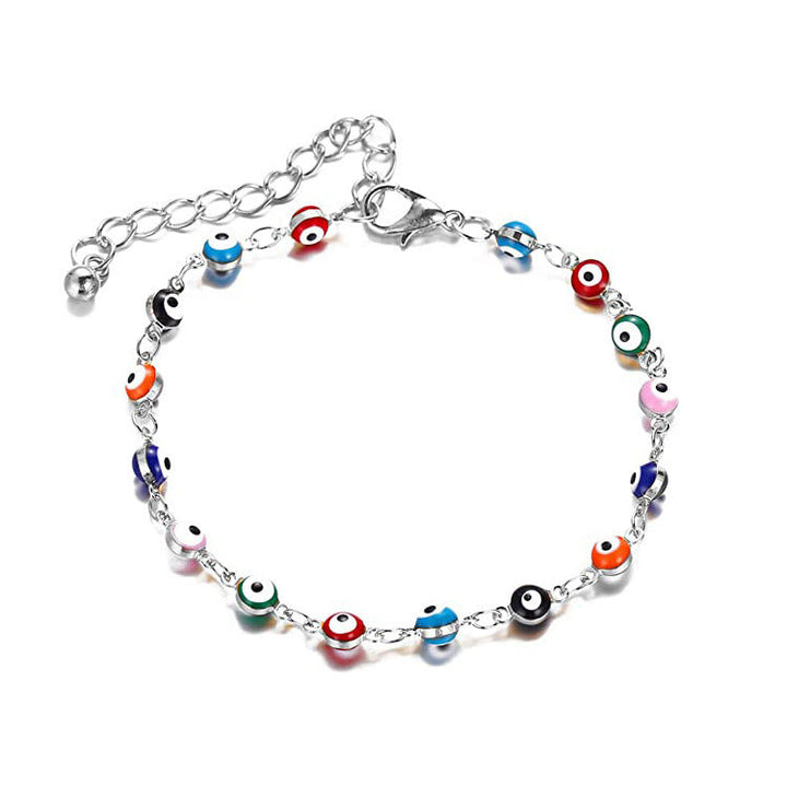 Ladies playful ankle bracelet with colorful glass eyes and delicate design Nin Boutique