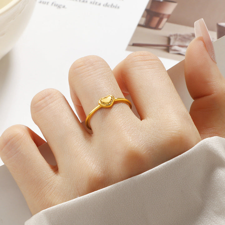 Ladies' delicate ring with heart-shaped design and sparkling accents Nin Boutique