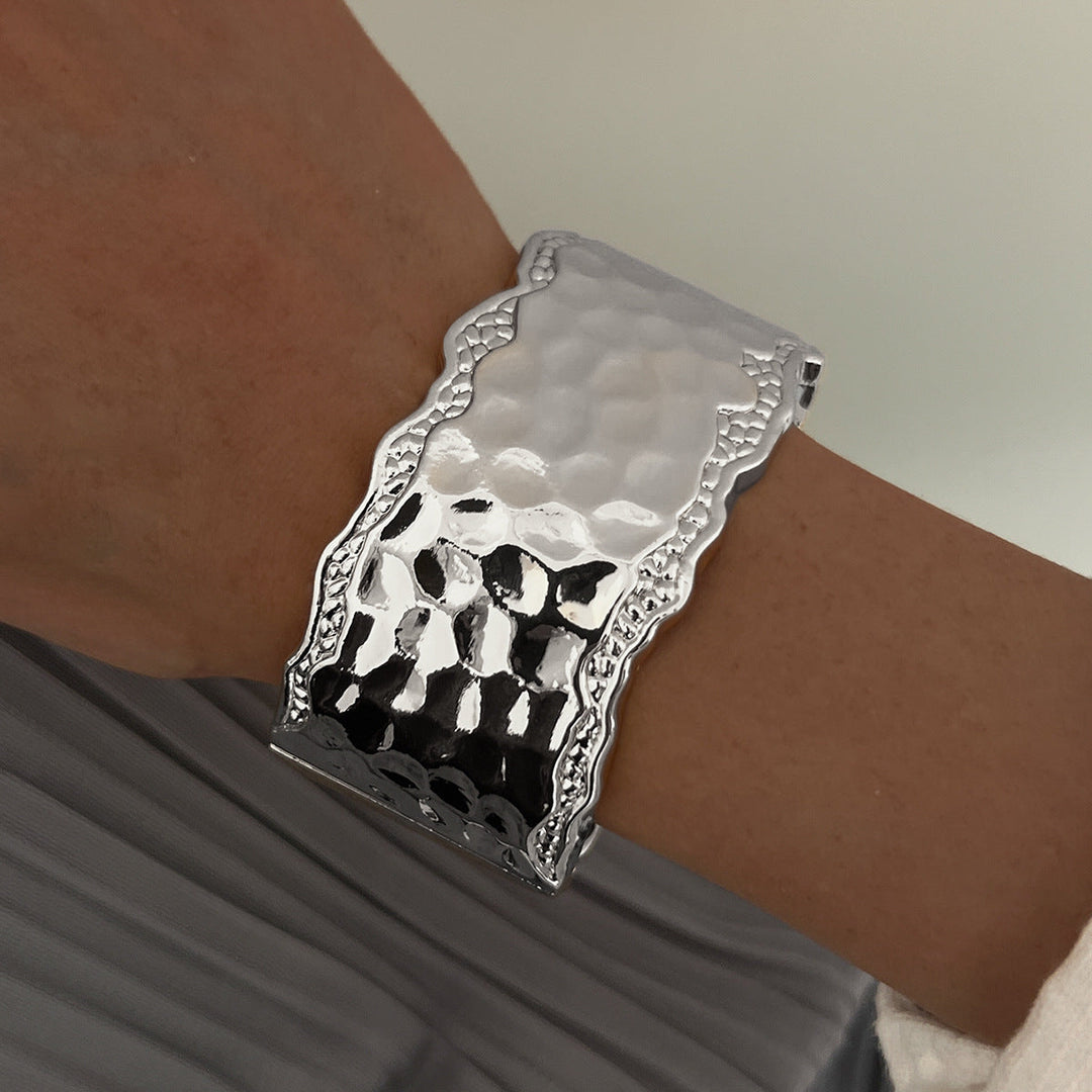 Ladies bangle with intricate hammered design Nin Boutique
