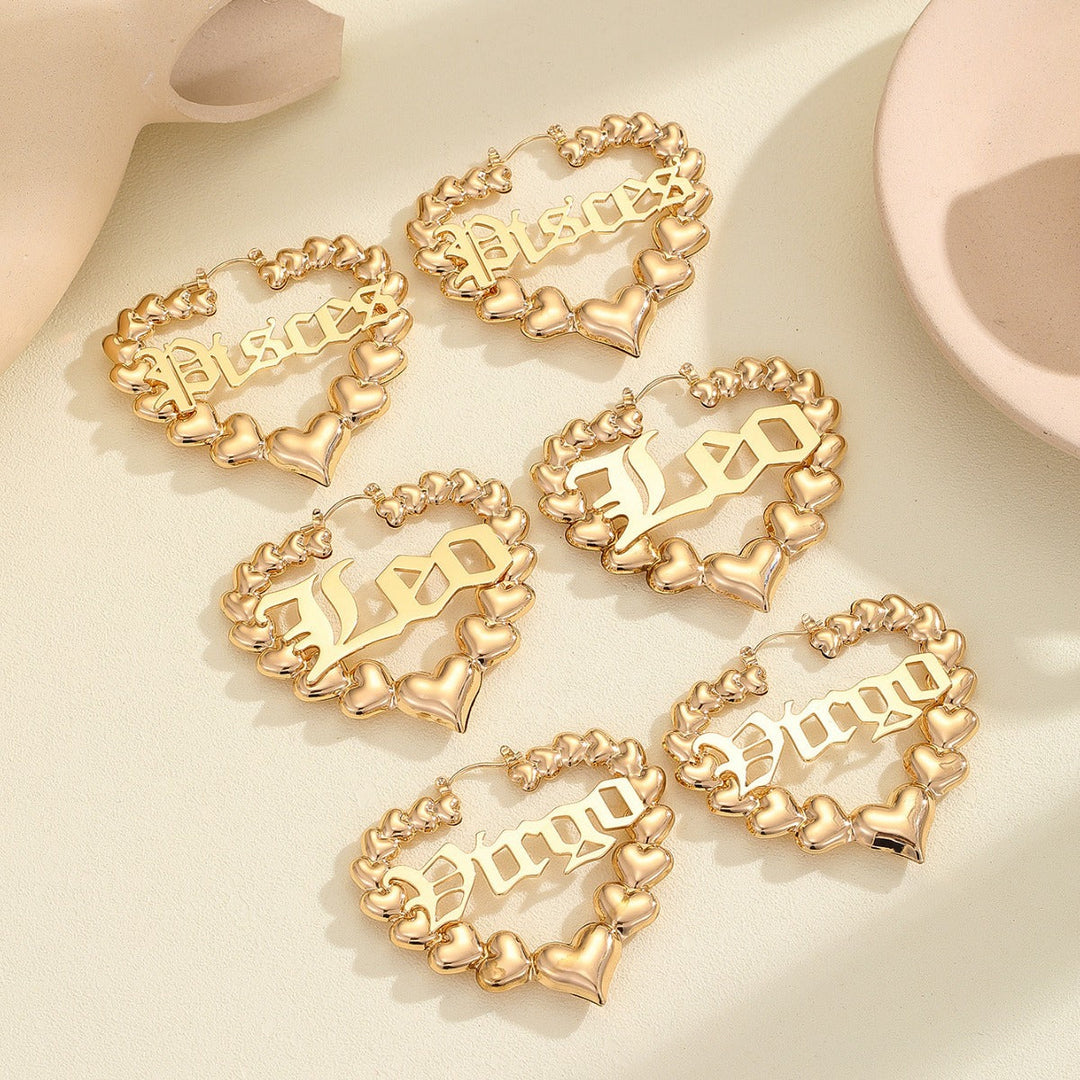 Women’s earrings with unique heart design and astrological element Nin Boutique