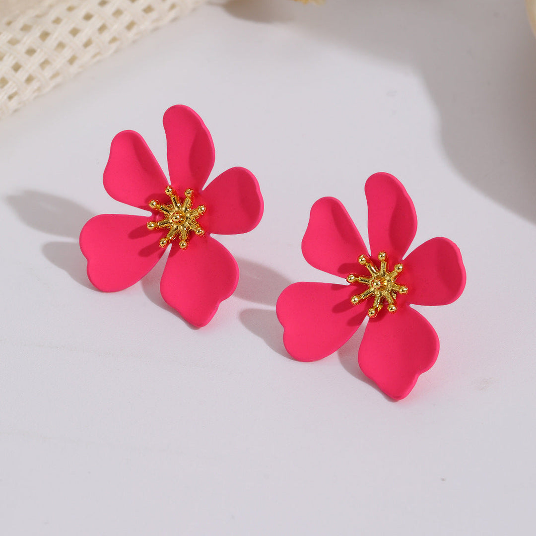 Women's earrings in floral design with shiny golden accent Nin Boutique
