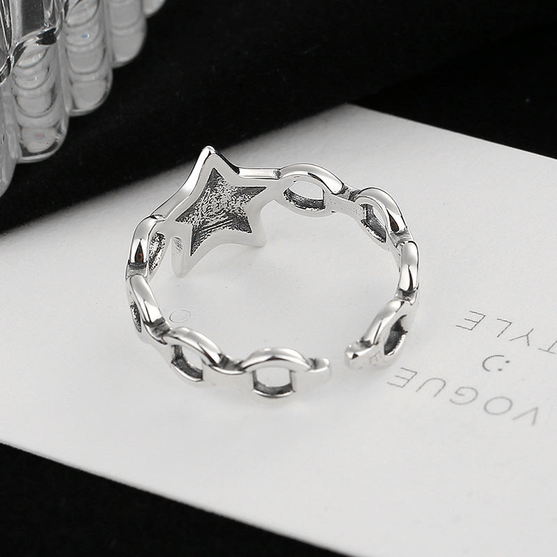 Women's ring with modern star design and engraved lettering Nin Boutique