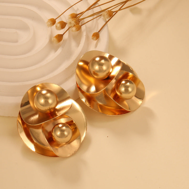 Ladies earrings in elegant wave pattern Nin Boutique