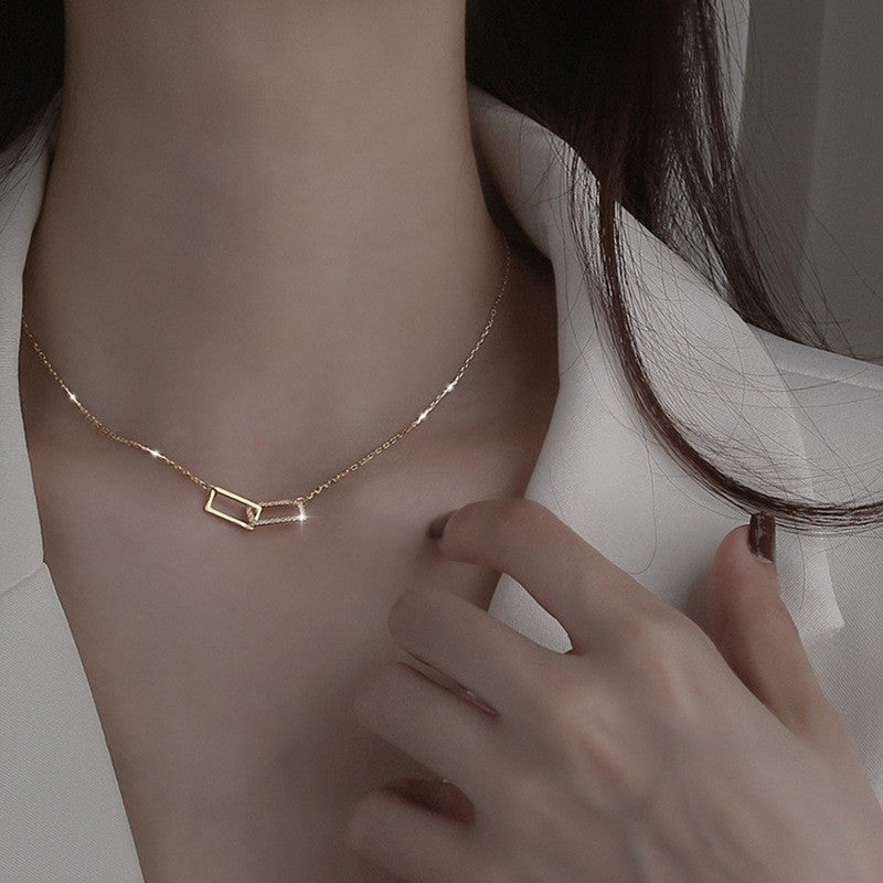 Women's necklace with modern, geometric pendants Nin Boutique
