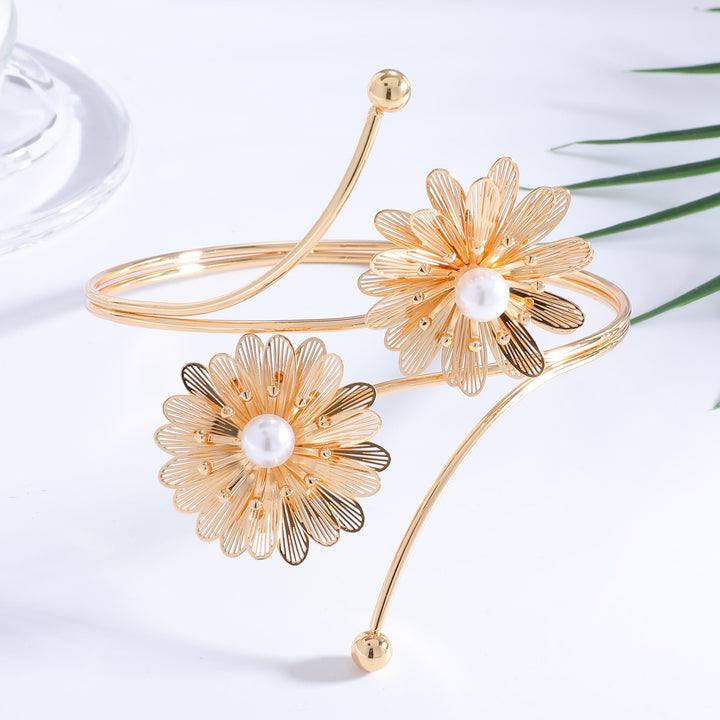 Ladies elegant arm jewelry with floral motifs Nin Boutique