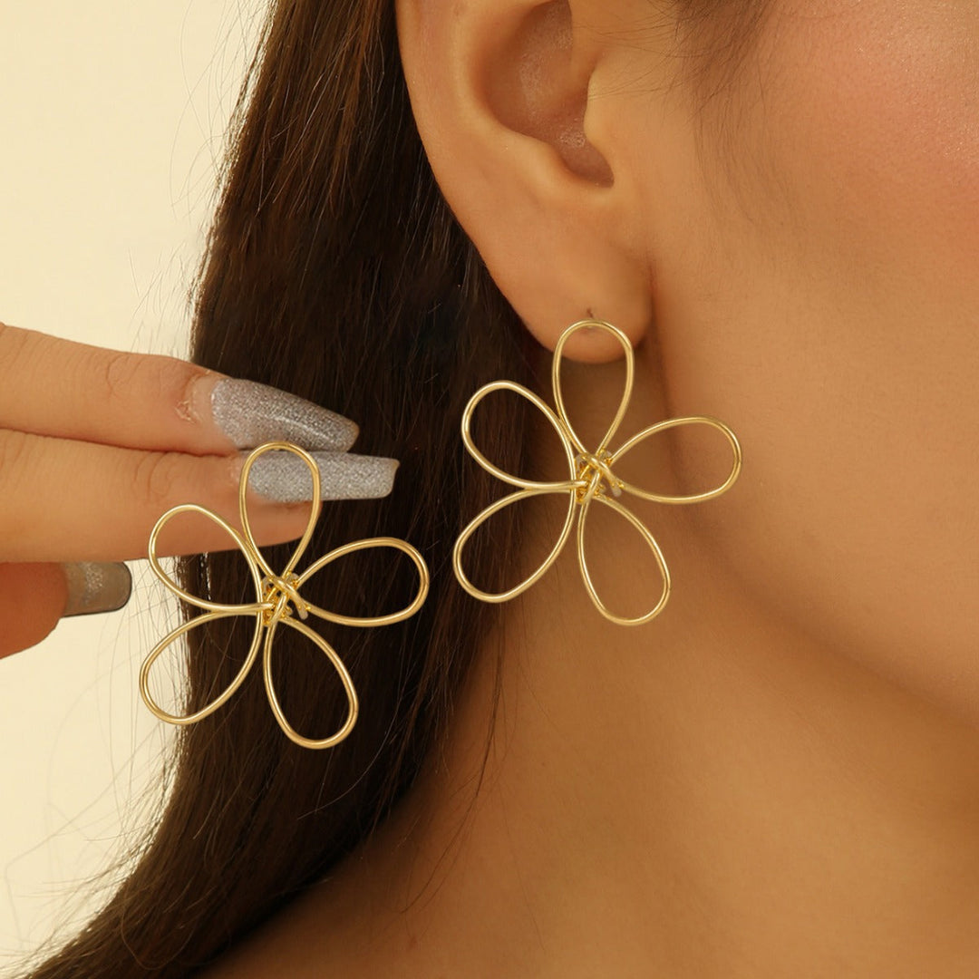 Ladies earrings in floral wire design Nin Boutique