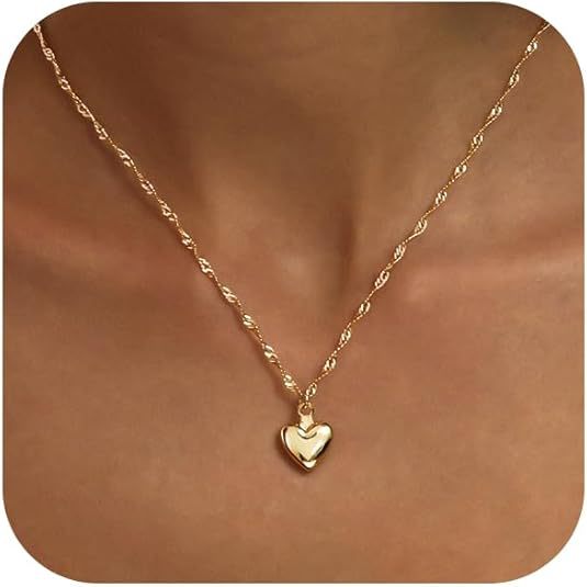 Women's elegant necklace with bow pendant and fine link design Nin Boutique