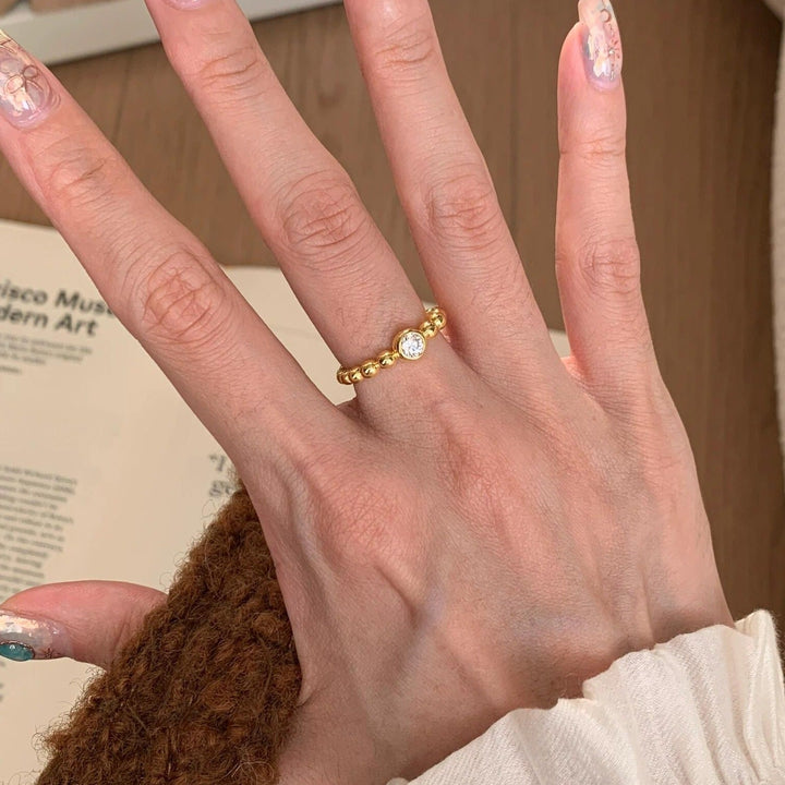Women's ring with sparkling zircon and ball design Nin Boutique