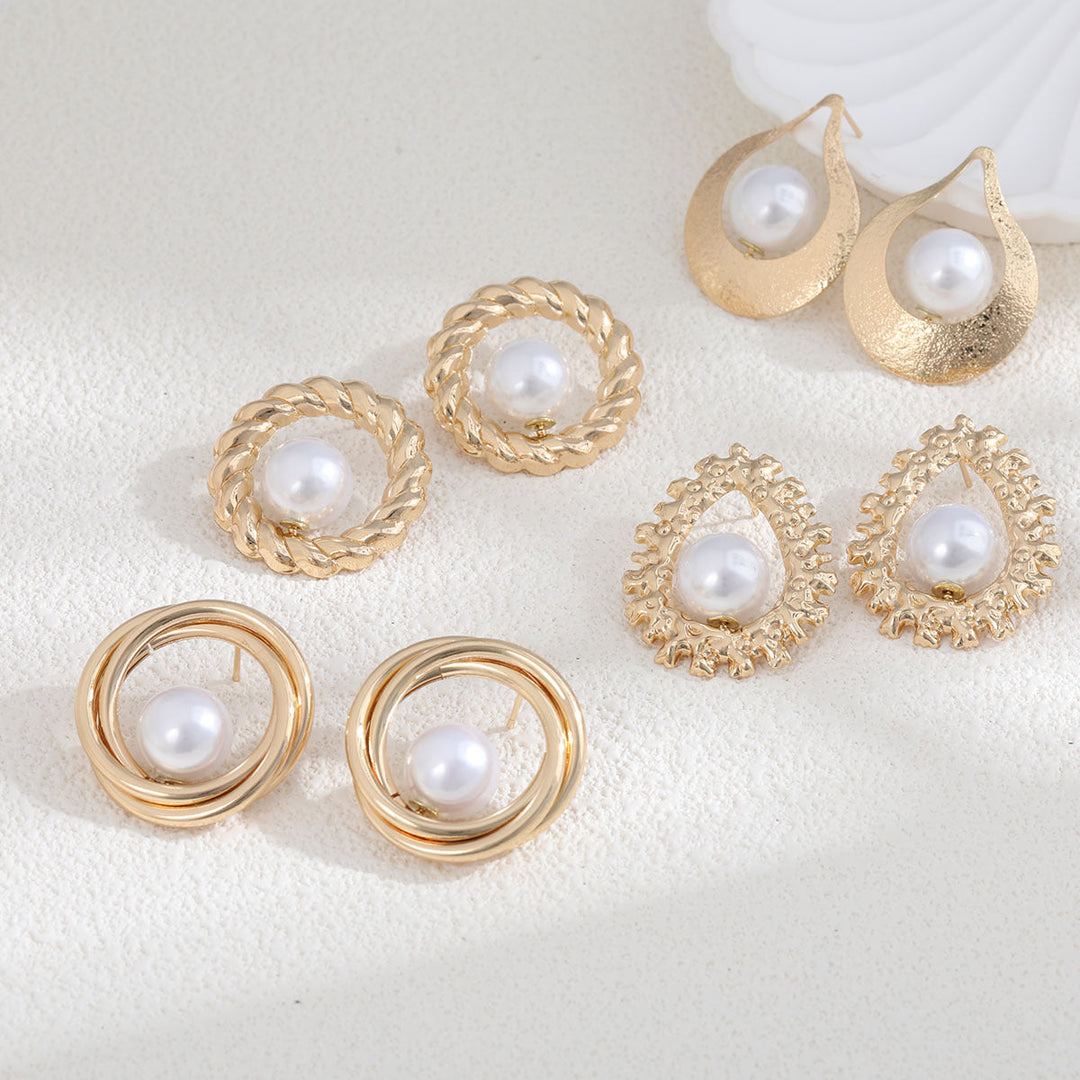Ladies earrings with heart-shaped design and artificial pearl Nin Boutique