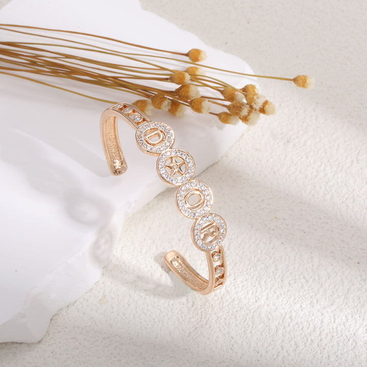 Women's bangle with artistic infinity symbol and sparkling zirconia Nin Boutique