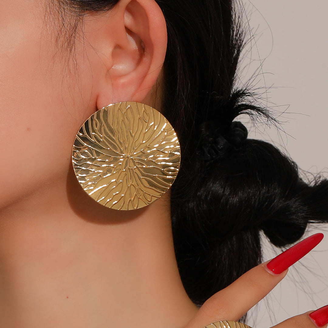Ladies cuff bracelet with luxurious relief design Nin Boutique