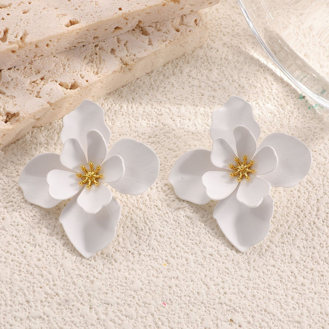 Ladies earrings in artistic floral style with pearl accent Nin Boutique