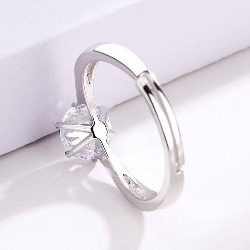 Women's ring with sparkling zircon and modern, curved design Nin Boutique