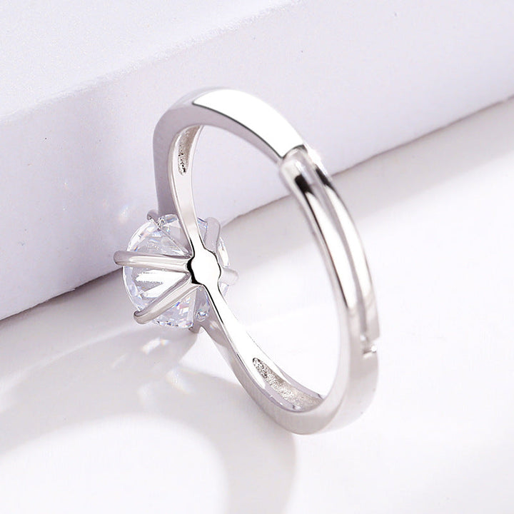 Women's ring with sparkling zircon and modern, curved design Nin Boutique