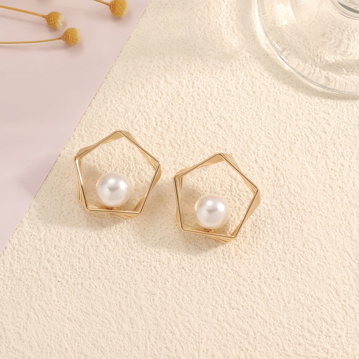 Women's earrings with elegant pearl and geometric shape Nin Boutique