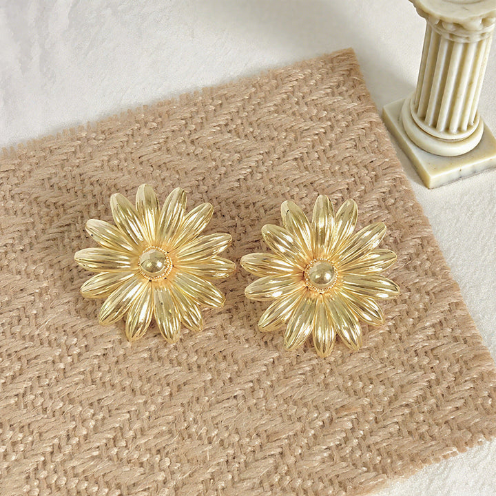 Ladies earrings in intricate flower design Nin Boutique