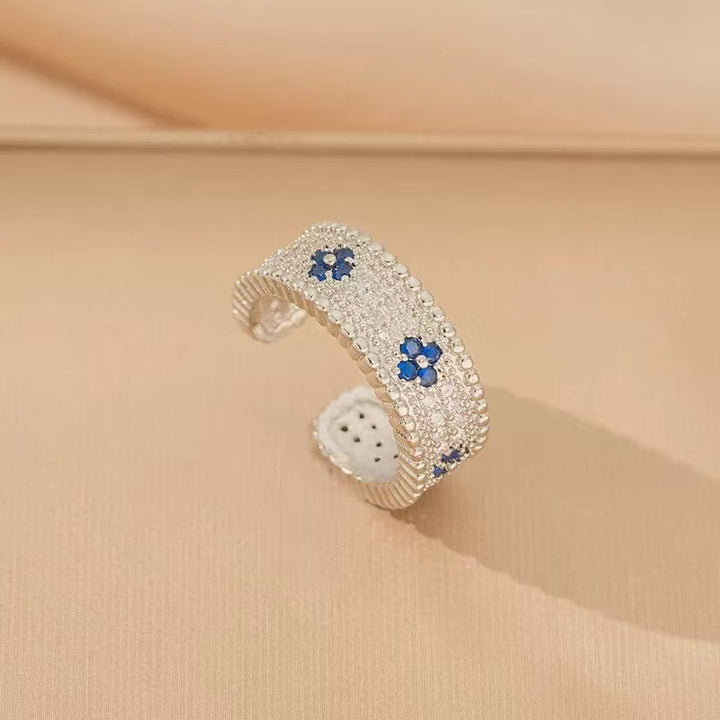Women's intricate quatrefoil pave cubic zirconia pendant necklace with sapphire accent Nin Boutique