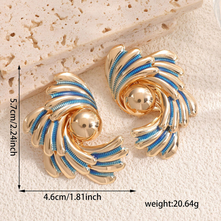 Ladies earrings with ornate wave pattern Nin Boutique