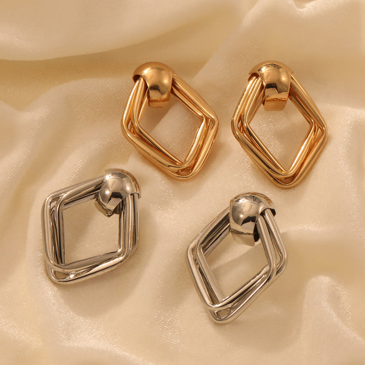 Women’s earrings in artistic, layered design Nin Boutique