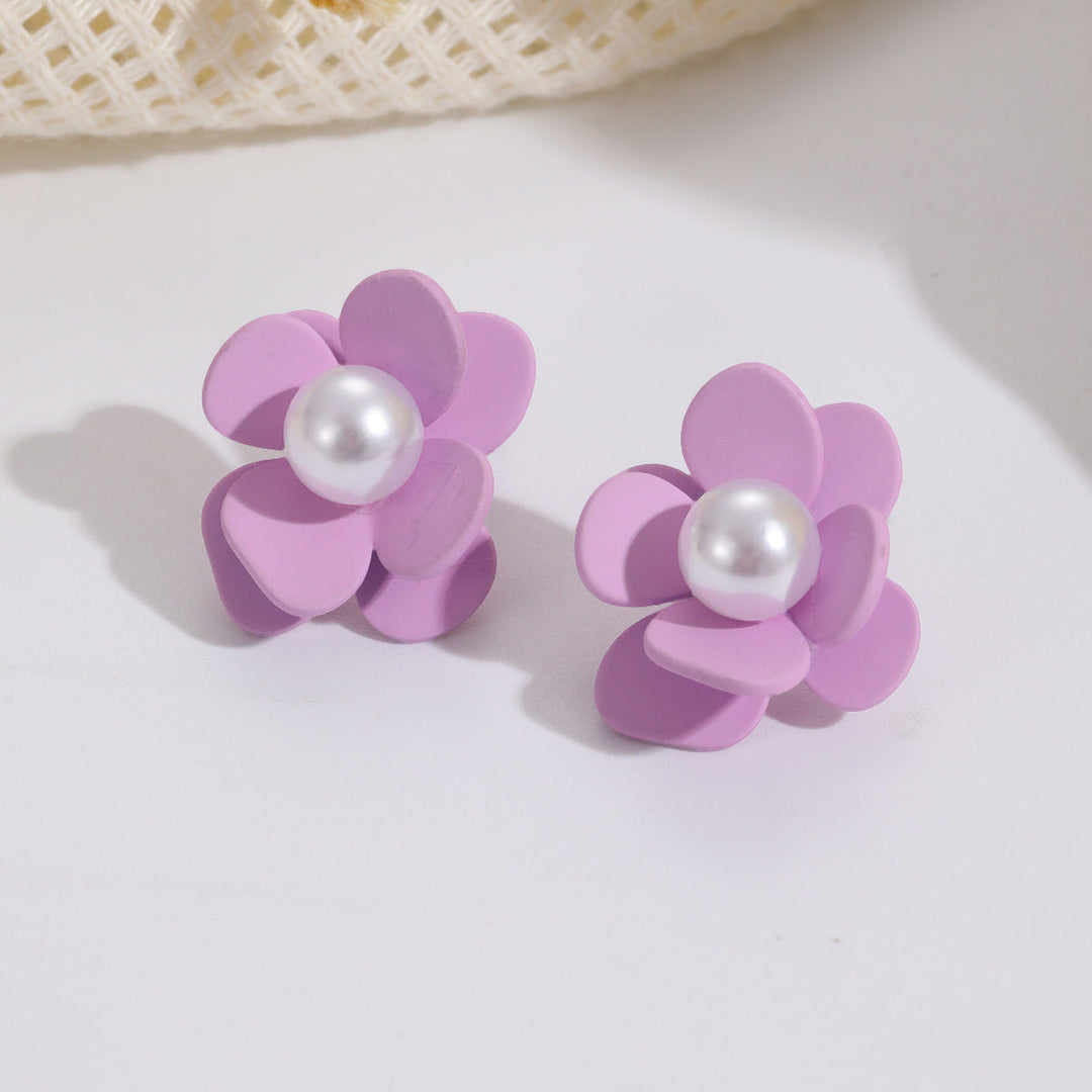 Ladies earrings in vibrant floral design with pearl accent Nin Boutique