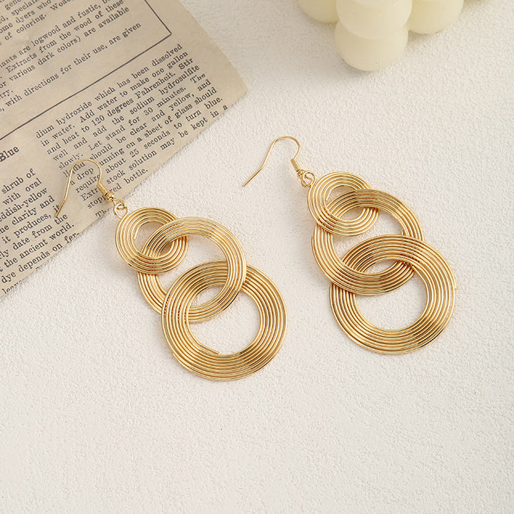 Ladies earrings with elaborate fan design Nin Boutique