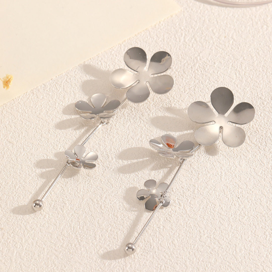 Women’s earrings with floral elements and shiny finish Nin Boutique