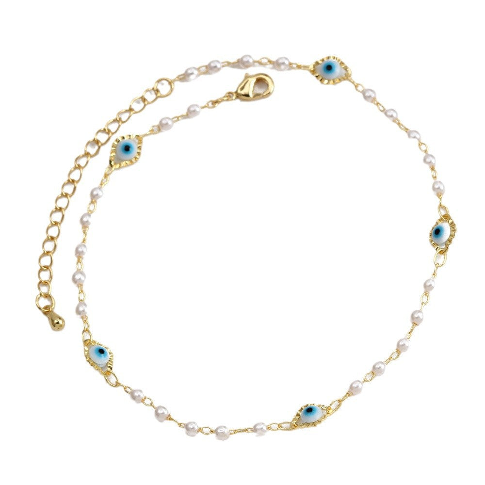 Women's ankle bracelet with protective eye and delicate pearl elements Nin Boutique
