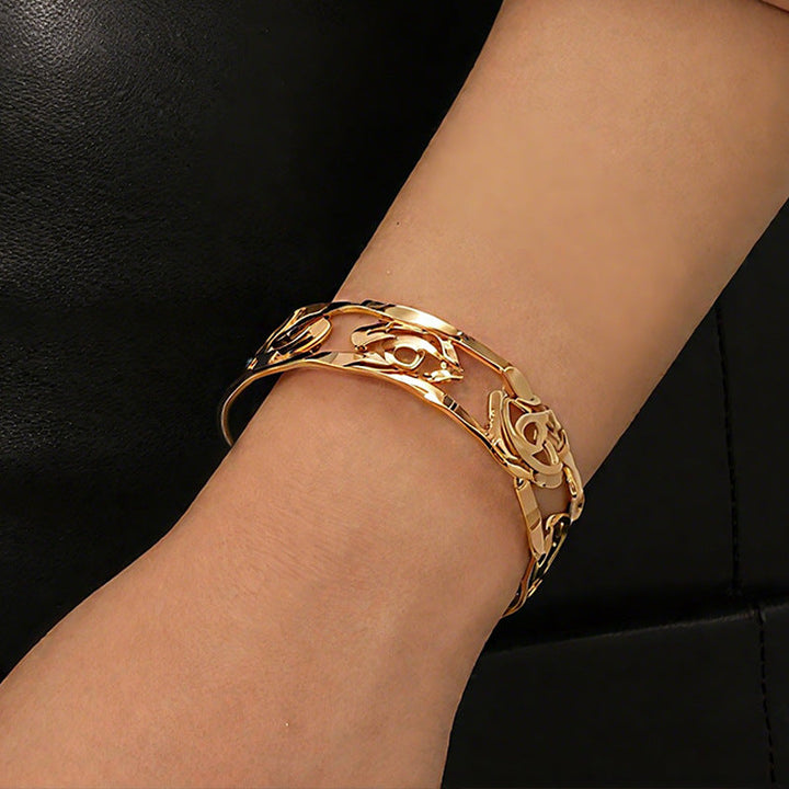 Women’s bangle with ornate rose design Nin Boutique