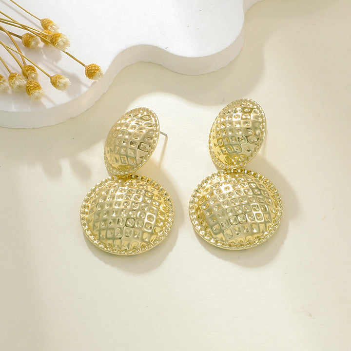 Ladies earrings in elegant relief design Nin Boutique