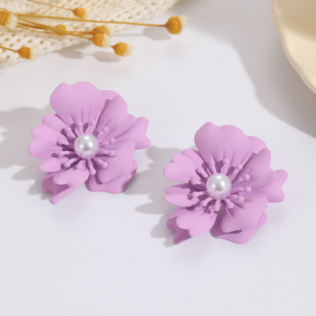 Ladies earrings with elaborate floral pattern Nin Boutique