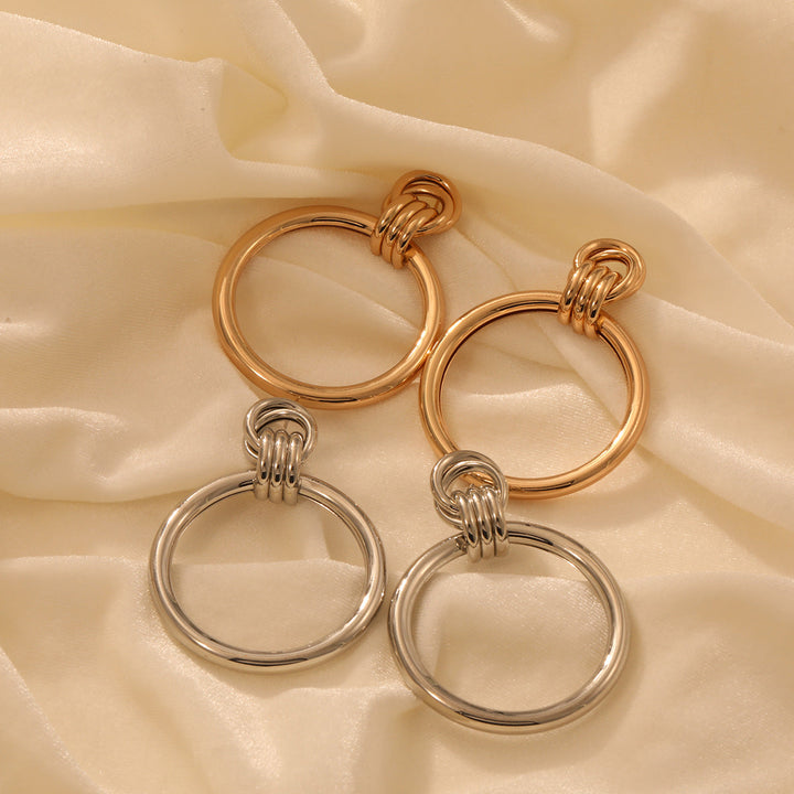 Ladies earrings with modern, curved design Nin Boutique