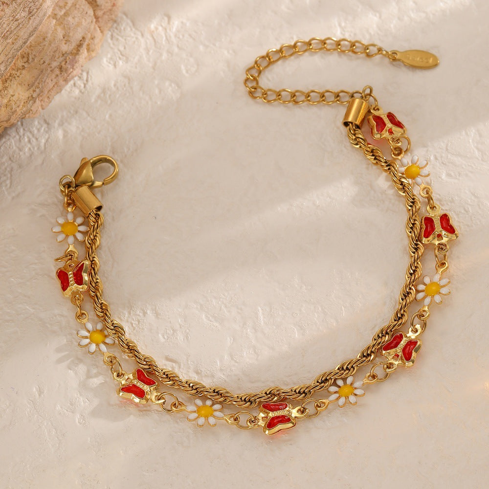 Ladies bracelet with elaborate pendants Nin Boutique