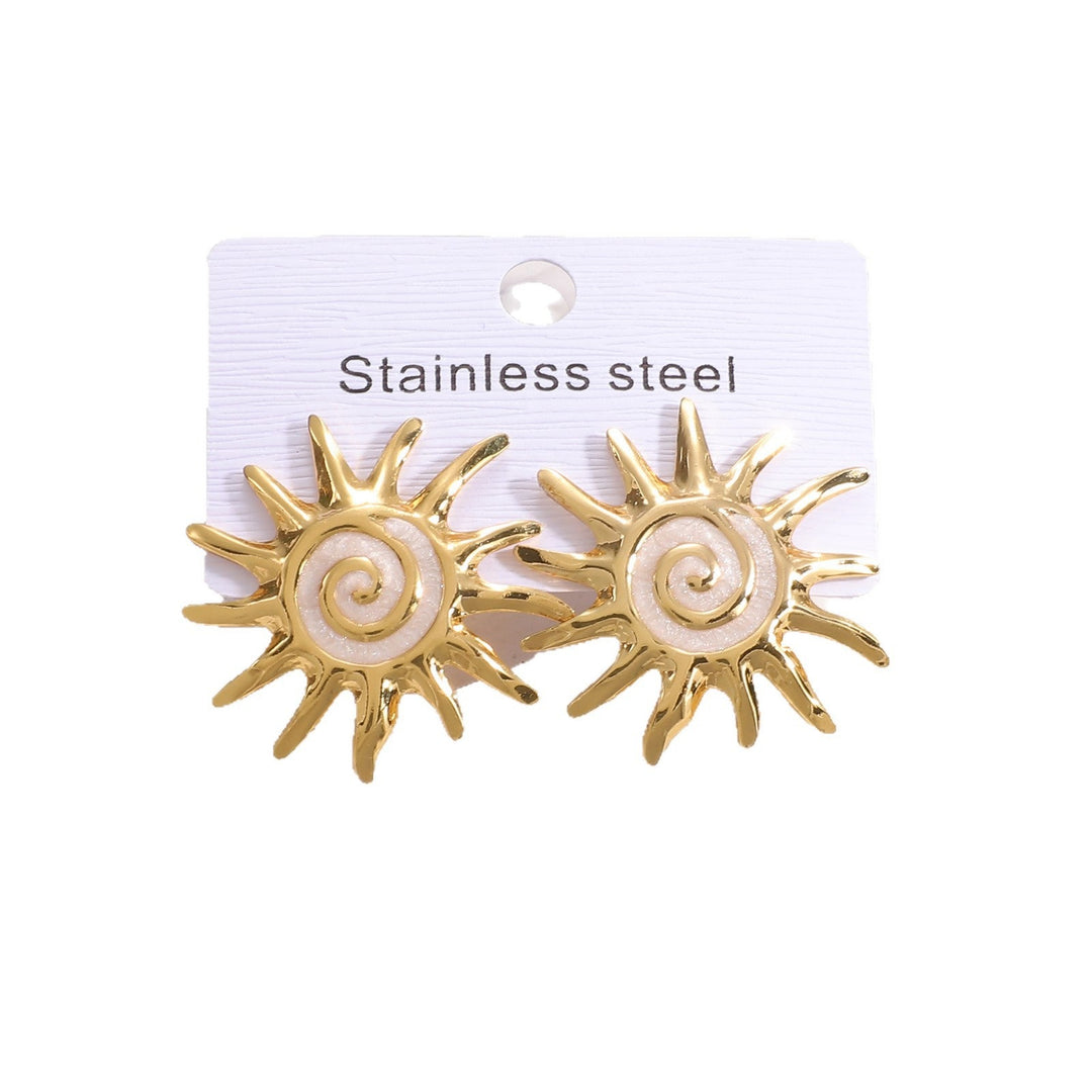 Ladies earrings in artistic sun motif Nin Boutique