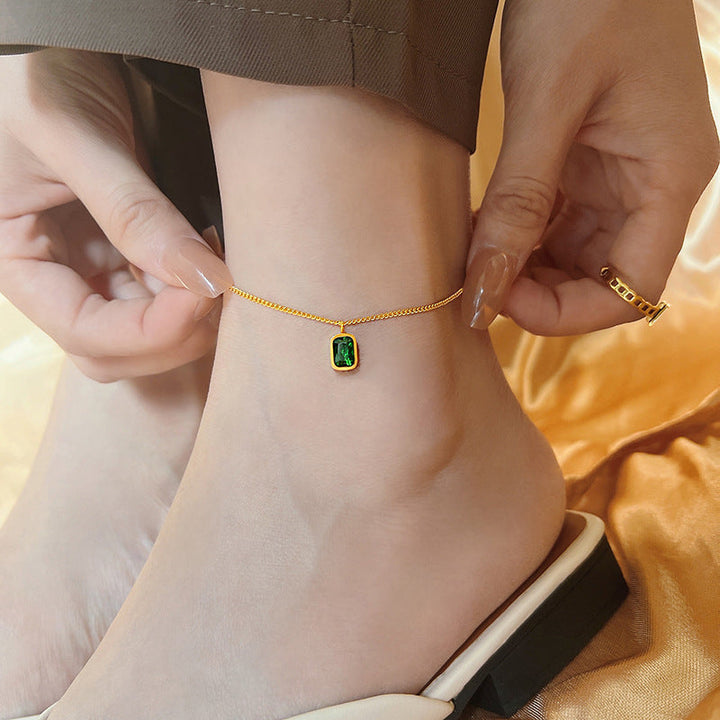 Ladies ankle bracelet with luxurious green crystal pendant Nin Boutique