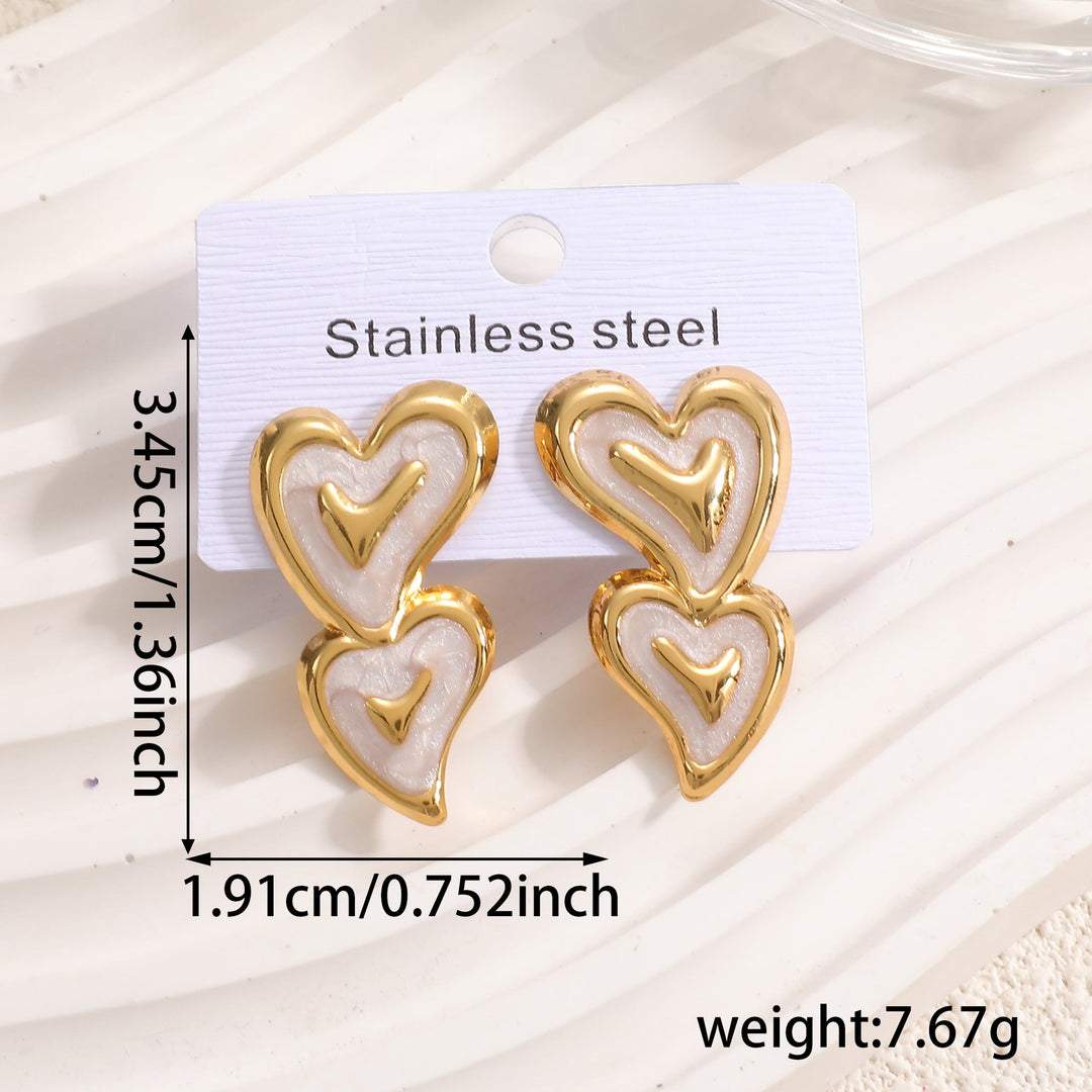 Ladies earrings in playful heart design Nin Boutique
