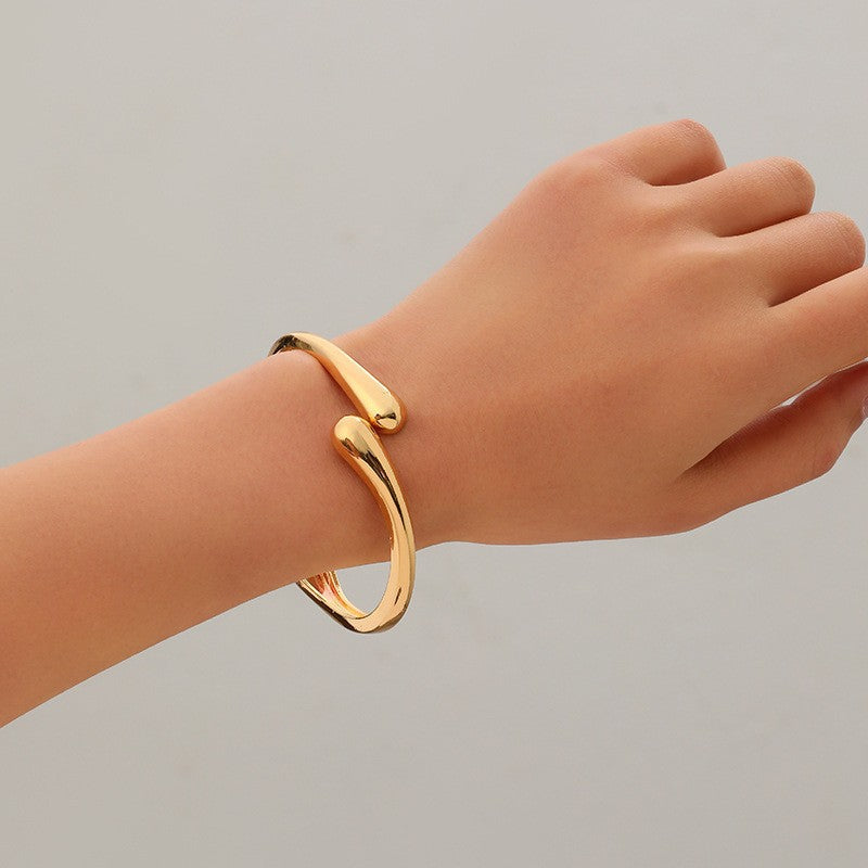 Women's Open Cuff Bracelet with Modern, Curved Design Nin Boutique