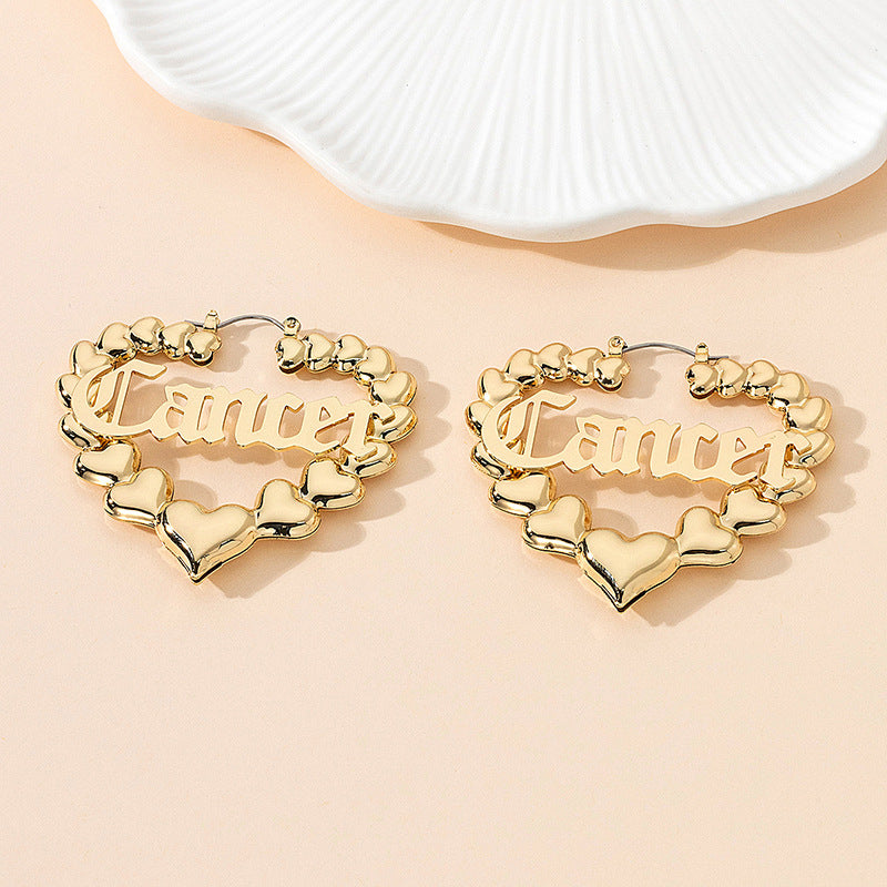 Women’s earrings with unique heart design and astrological element Nin Boutique