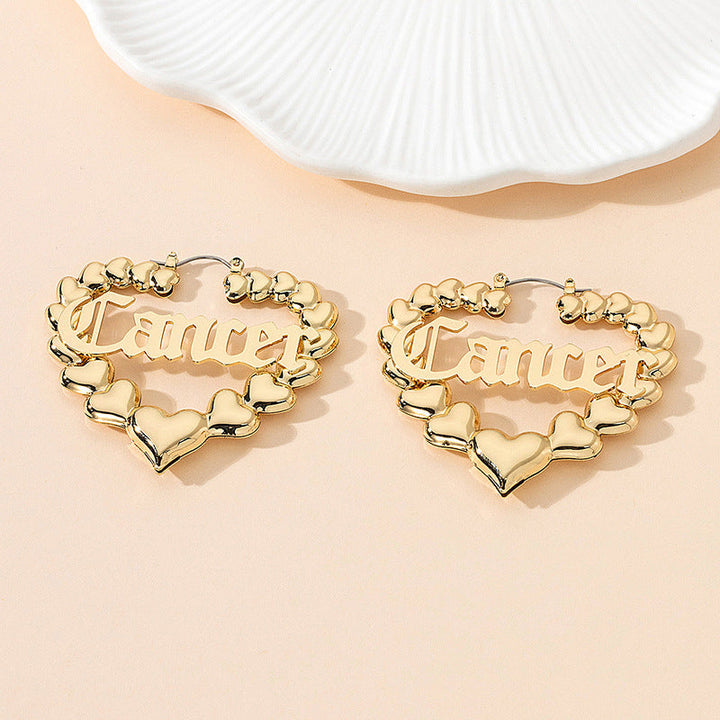 Women’s earrings with unique heart design and astrological element Nin Boutique