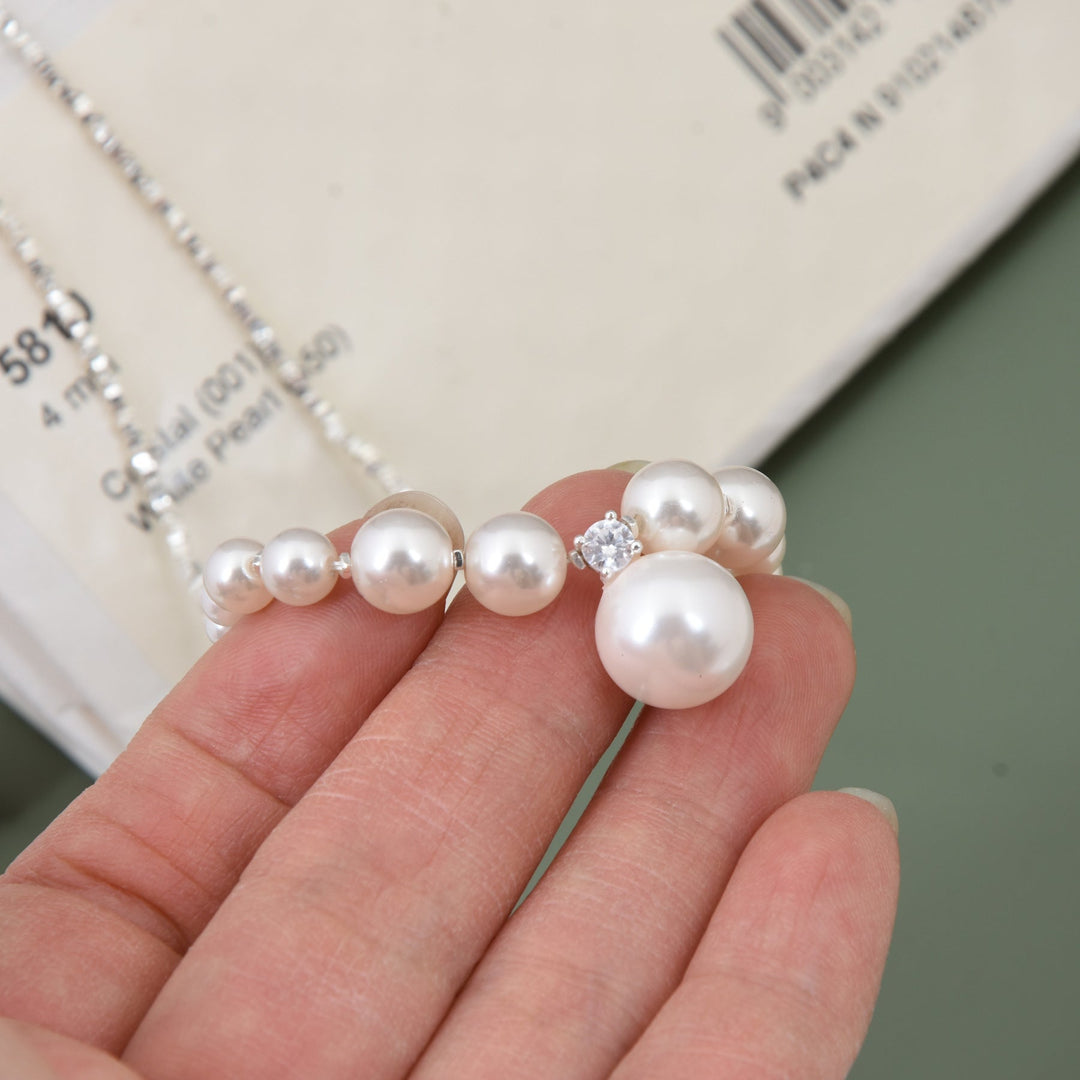 Women's necklace with shimmering pearls and sparkling details Nin Boutique