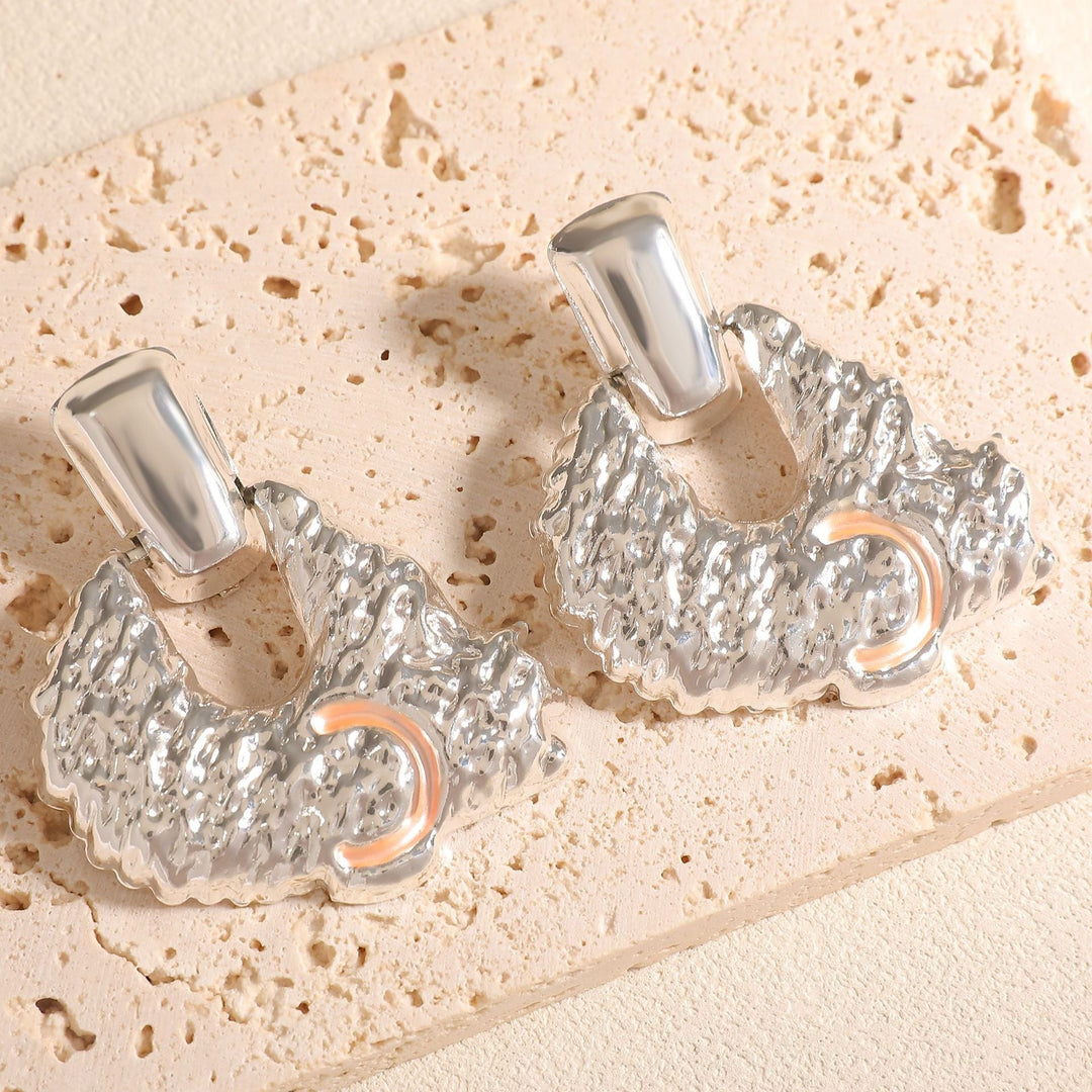 Women's earrings in artistic relief design Nin Boutique