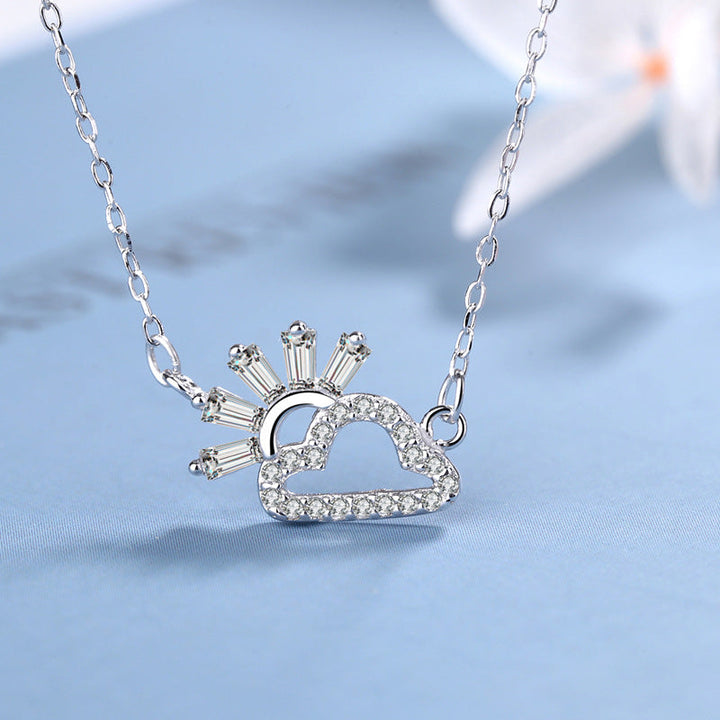 Women's necklace with playful cloud and sun pendant made of sparkling zircon Nin Boutique