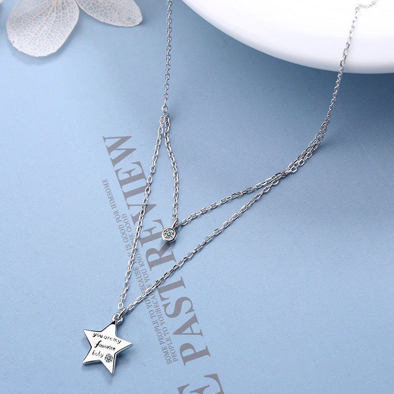 Women’s necklace with cheeky star pendant and sparkling detail Nin Boutique