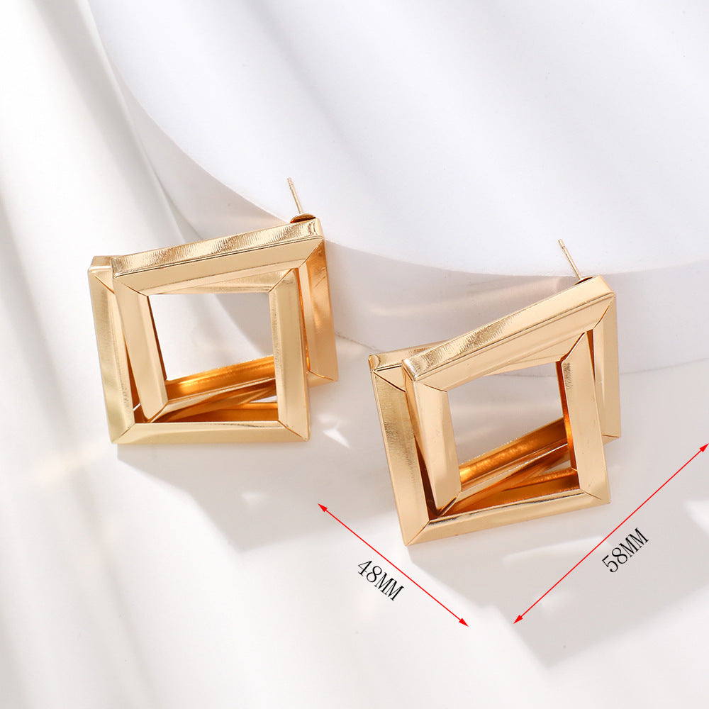 Ladies' earrings in contemporary square ring design Nin Boutique